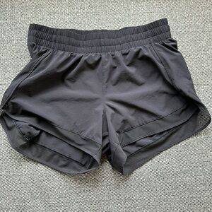 Athleta Mesh Racer Run Mid Rise Black Shorts